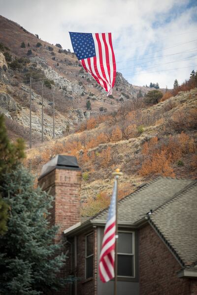 What's being billed as the world’s largest free-flying flag hangs in Cold Water Canyon in North Ogden on Sunday, Nov. 11, 2018. The huge flag was displayed by a local group called Follow the Flag in honor of North Ogden Mayor Brent Taylor who was killed e