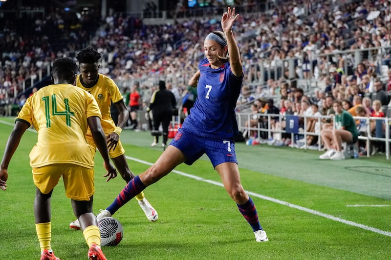 United States’ Ashley Hatch, right, tries to control the ball as South Africa’s Tiisetso Makhubela, left, defends during a match.