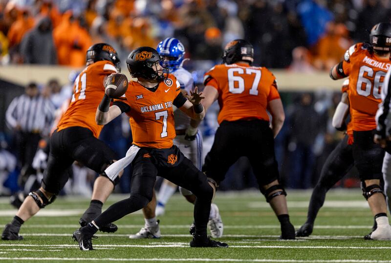 Oklahoma State quarterback Alan Bowman passes during game against BYU on Saturday, Nov. 25, 2023, in Stillwater, Okla.