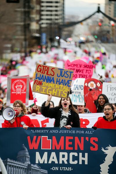 Participants in the Women's March on Utah walk up State Street to the Capitol in Salt Lake City on Saturday, Jan. 19, 2019.