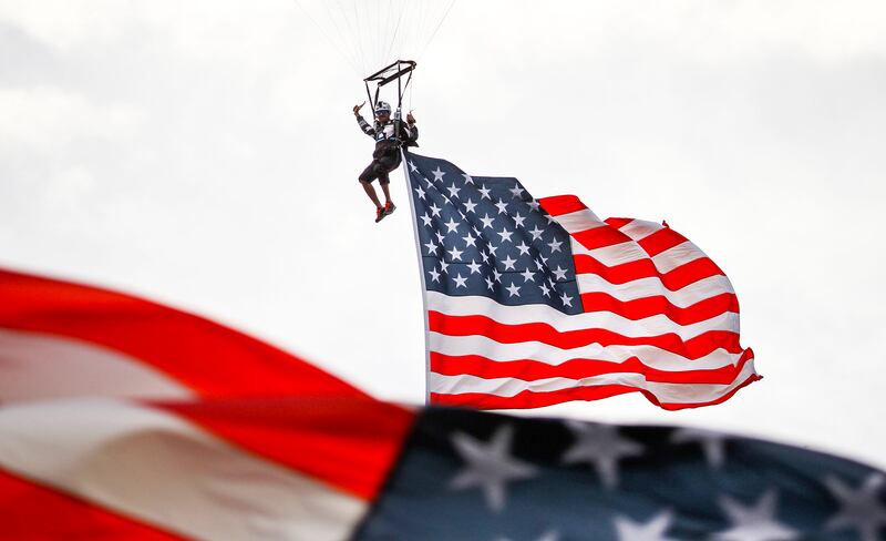 Skydivers drop onto the field at 36th annual Stadium of Fire at LaVell Edwards Stadium in Provo on Saturday, July 2, 2016.