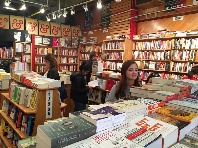 Book shoppers browse at Kramerbooks & Afterwords Cafe, a bookstore and eatery in the Dupont Circle neighborhood of Washington. D.C, on Feb. 20, 2016.