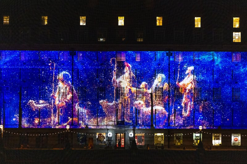 A "Light the World" image of the shepherds at the birth of Christ on London County Hall on Nov. 13, 2024.