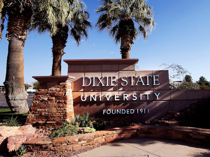 Palm trees flank an entrance to Dixie State University in St. George.