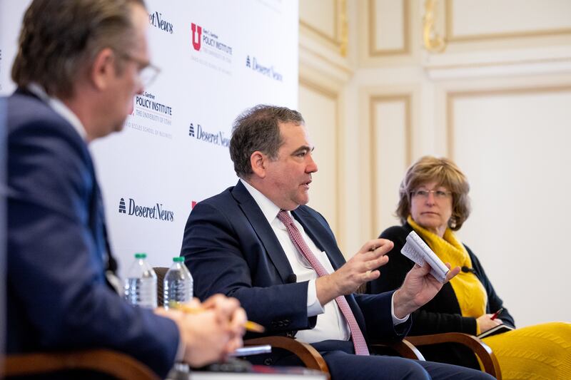 Jesse Hyde, editor of Deseret Magazine, moderates a discussion with Daniel F. Runde and Bonnie Glick, in Salt Lake City.