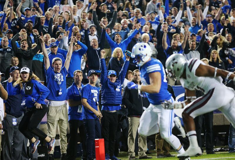BYU fans go crazy as Brigham Young Cougars tight end Tanner Balderree (89) runs in for the go ahead touch down as BYU and Mississippi State play in Provo at LaVell Edwards Stadium on Friday, Oct. 14, 2016.