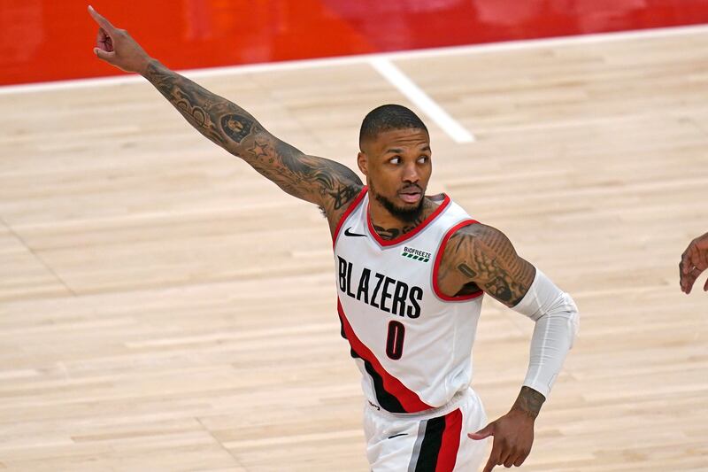 Portland Trail Blazers guard Damian Lillard runs upcourt after scoring against the Utah Jazz
