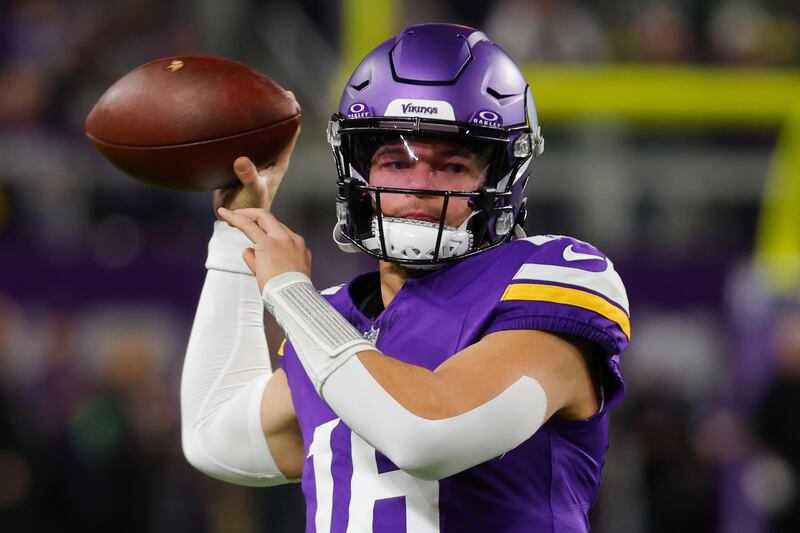 Minnesota Vikings’ Jaren Hall warms up before an NFL game against the Green Bay on Dec. 31, 2023.