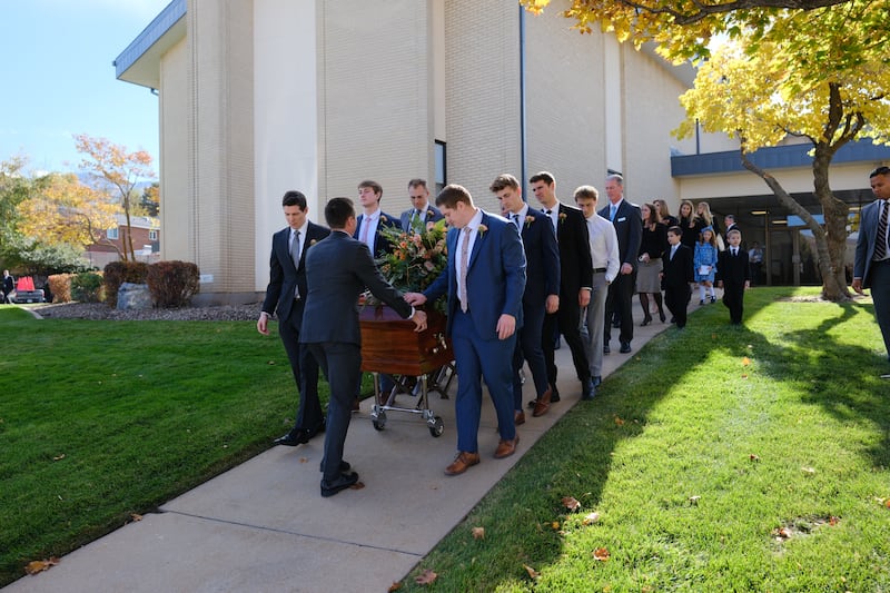 The pallbearers guide the casket of Sister Kathleen Johnson Eyring after her funeral in Bountiful, Utah, on Oct. 21, 2023.