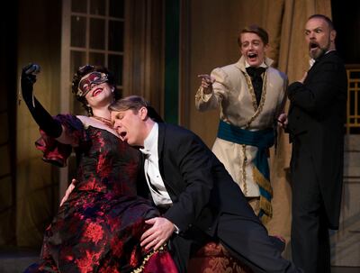 Sara Gartland as Rosalinde, Daniel Belcher as Eisenstein, Abigail Levis as Prince Orlofsky and Troy Cook as Dr. Falke perform in a scene from Utah Opera's upcoming production, "Die Fledermaus," at the Capitol Theatre in Salt Lake City on Wednesday, May 2,