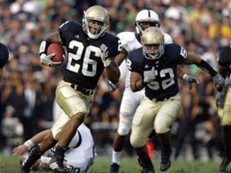 Notre Dame's Travis Thomas (26) runs for 43 yards on a fake punt against Penn State in a 41-17 victory for the Irish in South Bend, Ind., on Saturday.