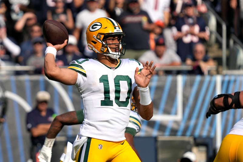 Green Bay Packers quarterback Jordan Love passes during the first half of an NFL football game against the Chicago Bears.