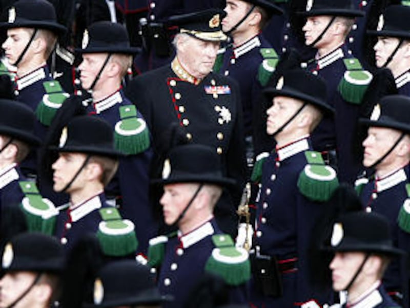 Norway's King Harald is surrounded by soldiers Friday during an inspection of the Norwegian Royal Guard in Oslo. The Royal Guard was founded in 1856 when King Oscar I decided to underline his status as king of both Norway and Sweden.