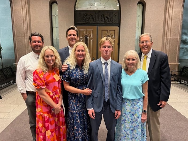 Left to right: John Money, daughter April Money, Tad Baltzer, Amber Baltzer, Saxon Baltzer, Kris Anne Gustavson and Paul Gustavson at the Newport Beach Temple.