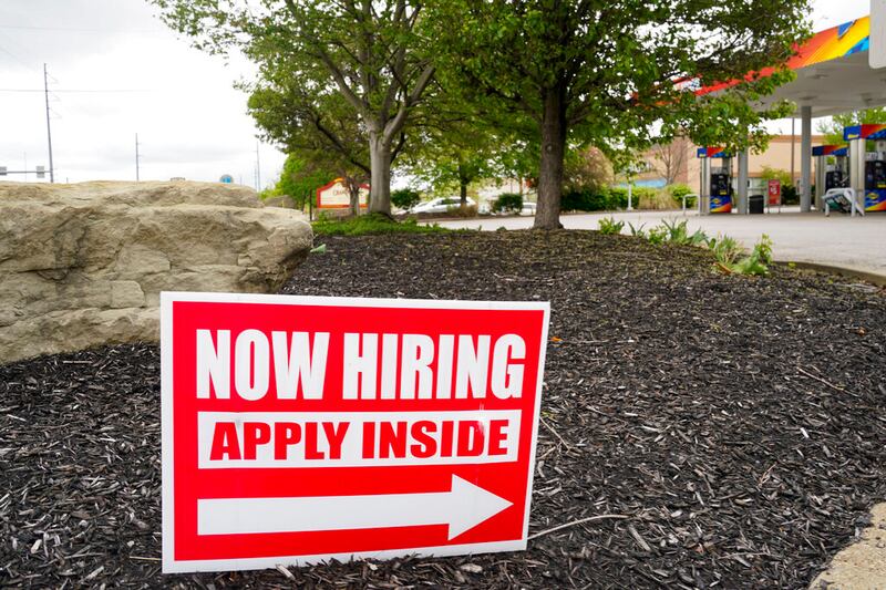 Hiring signs for a new job.