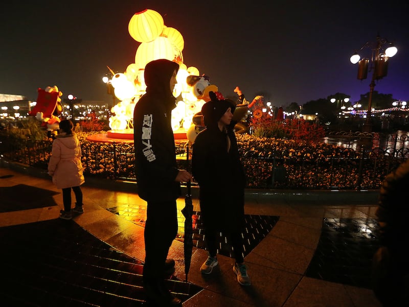 Jimmer Fredette walks with his wife, Whitney, to a ride in Disneyland in Shanghai, China, on Jan 20, 2018. Fredette is a former BYU Cougar and now plays for the Shanghai Sharks in the Chinese Basketball Association.
