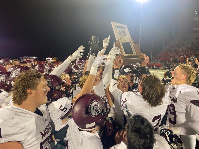 Morgan lifts the trophy