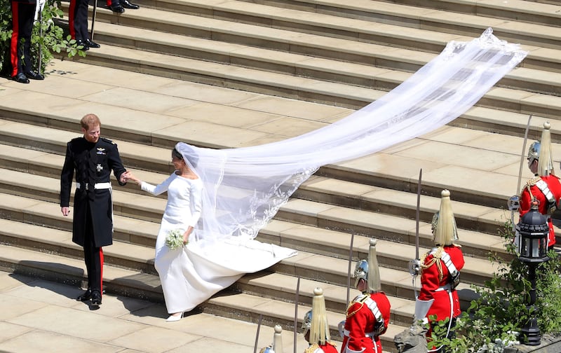 Britain’s Prince Harry and Meghan Markle leave after their wedding ceremony at Windsor Castle, England, on May 19, 2018.