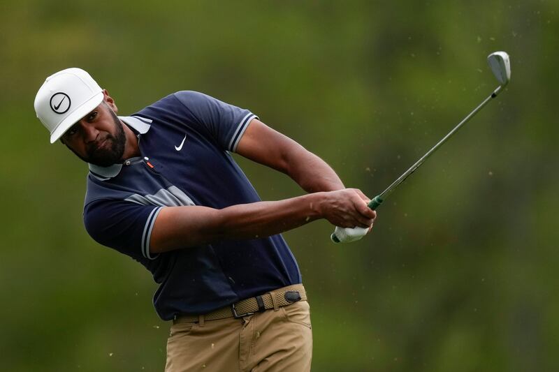 Tony Finau hits on the 12th hole during the second round at the Masters on Friday, April 8, 2022, in Augusta, Ga.