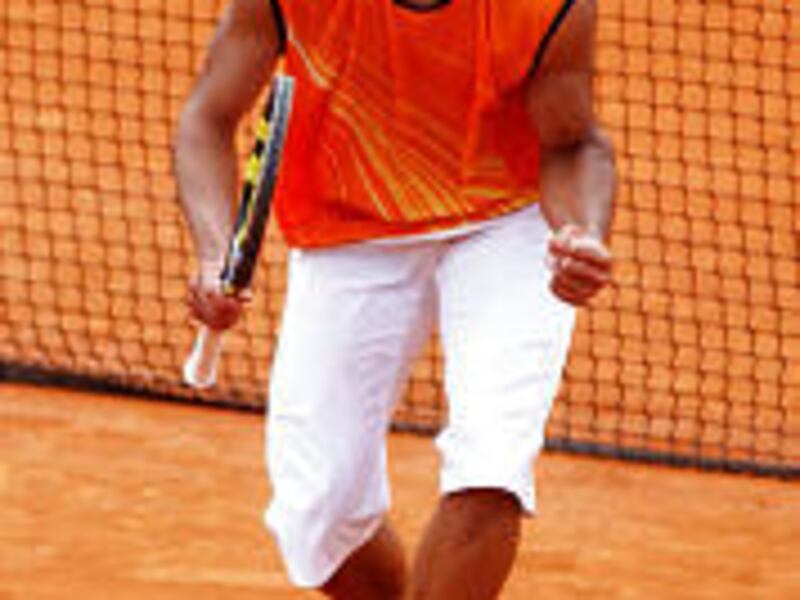 Rafael Nadal of Spain reacts after defeating defending champion Guillermo Coria. of Argentina.