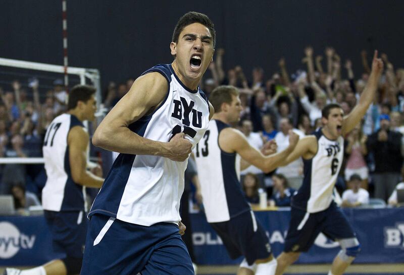 BYU's Taylor Sander celebrates a game point in the first set against Long Beach State. The BYU Men's Volleyball team defeats Long Beach State in the Quarterfinals of the MPSF Tournament.
