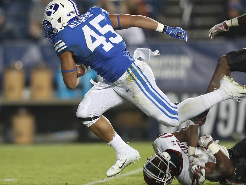 BYU running back Tyler Allgeier runs against Mexico State in Provo on Saturday, Nov. 17, 2018.