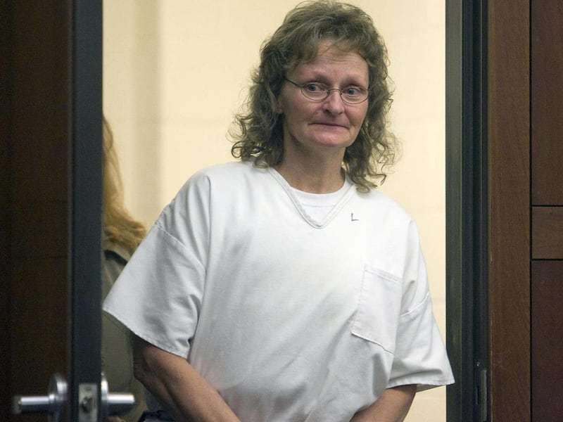 FILE - In this file photo taken Tuesday, Jan. 18, 2011, in Ogden, Utah, Debra Brown enters Judge Michael DiReda's courtroom in Ogden, Utah. A Utah judge ruled Monday, May 2, 2011 that Brown, who is serving a life sentence after being convicted of murderin