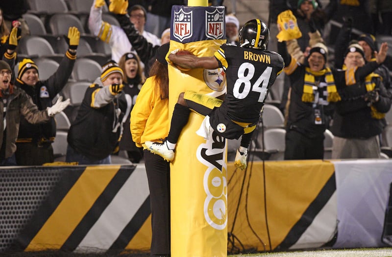 FILE - In this Dec. 6, 2015, file photo, Pittsburgh Steelers wide receiver Antonio Brown (84) leaps onto the goal post after scoring a touchdown during the second half of an NFL football game against the Indianapolis Colts in Pittsburgh. Don't twerk. Don'