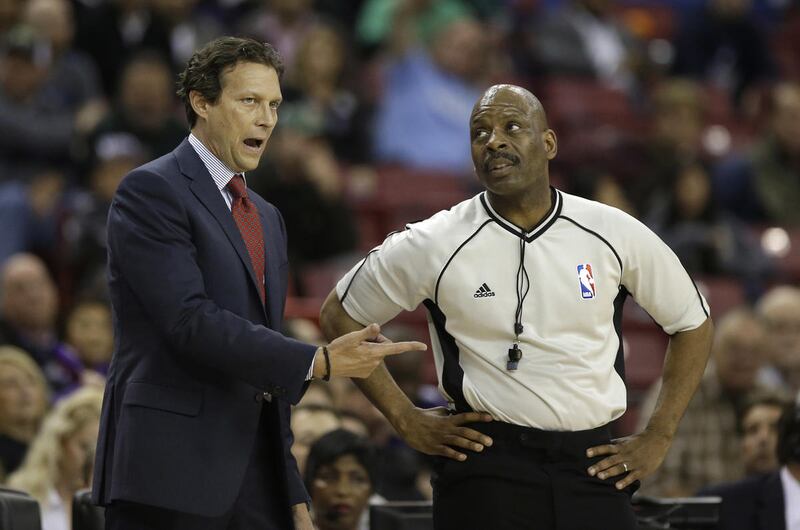 Utah Jazz head coach Quin Snyder questions official Derek Richardson about a foul call during the second half of an NBA basketball game against the Sacramento Kings, Sunday, March 13, 2016, in Sacramento, Calif. The Jazz won 108-99.(AP Photo/Rich Pedronce