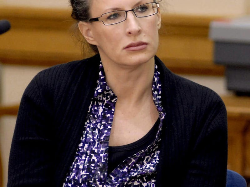 FILE - In this Oct. 27, 2011 file photo, Tracey Richter listens to testimony during her first-degree murder trial in Fort Dodge, Iowa. An Iowa judge sentenced Richter to life in prison Monday, Dec. 5, 2011, for killing a neighbor in the small northwest Io