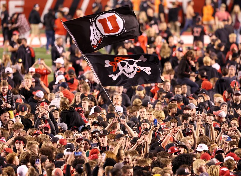 Utah fans storm the field after Utah defeated USC on Saturday, Oct. 15, 2022.