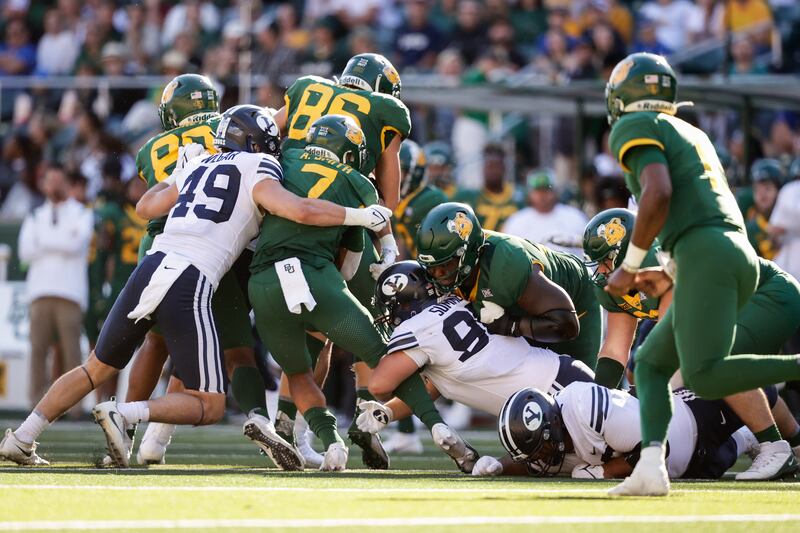 BYU linebacker Payton Wilgar makes a tackle during the Cougars’ loss to Baylor in Waco, Texas, on Saturday, Oct. 16, 2021.