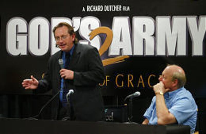 Filmmaker Richard Dutcher, with Larry Miller at his side, announces his upcoming movie "God's Army 2."