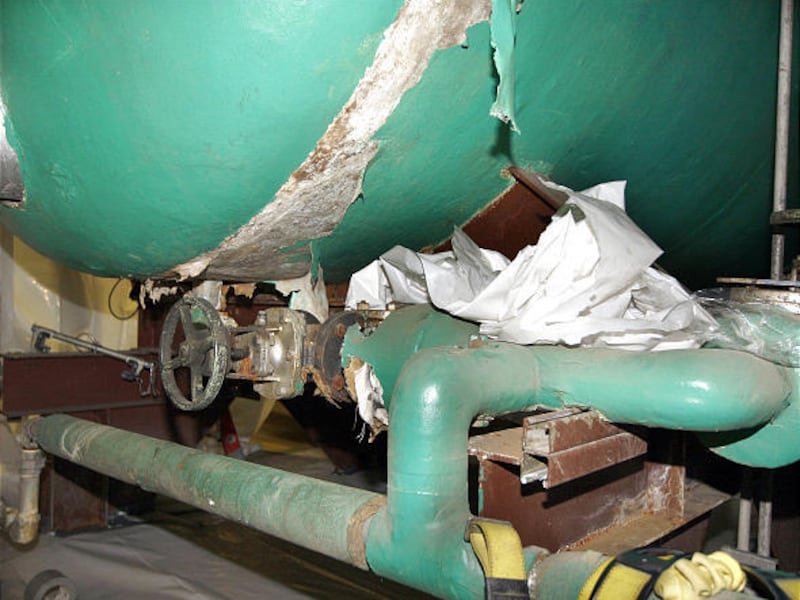 Removal of asbestos, a carcinogen coating these tanks, began Thursday in Salt Lake City.