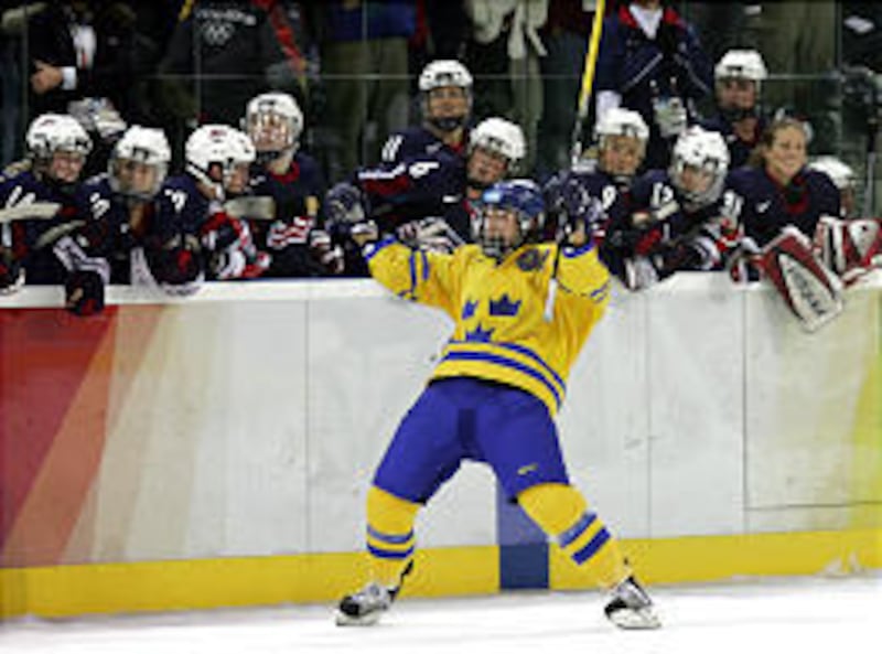 Sweden's Maria Rooth celebrates after scoring the game-winning goal in Friday's shootout victory over the United States.