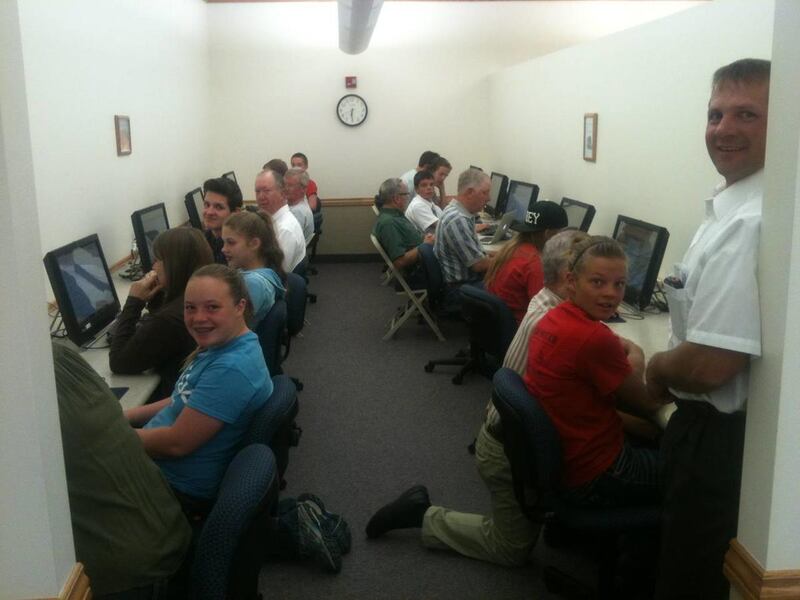 Youths of the Maeser 2nd Ward, Vernal Utah Maeser Stake, index early in the morning at the Vernal Family History Center.
