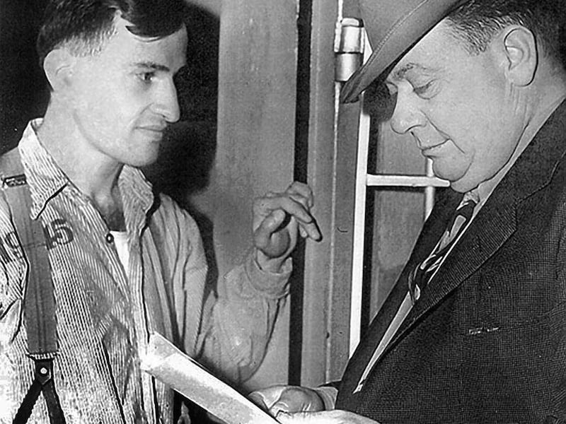 In this undated photo provided by the Museum of Colorado Prisons via The Pueblo Chieftain, shows inmate Joe Arridy, left, meeting with Warden Roy Best in Canon City, Colo. Outgoing Gov. Bill Ritter on Friday, Jan. 7, 2011, awarded a posthumous pardon to 2