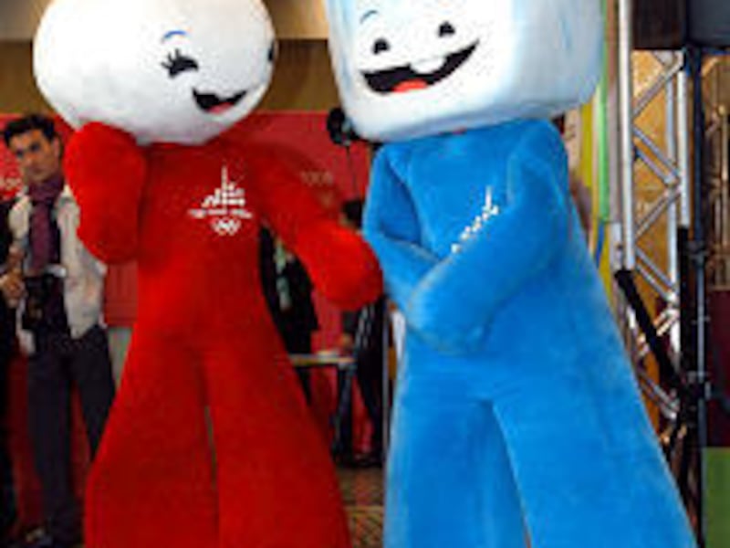 The 2006 Turin Winter Olympic mascots Neve, left, and Gliz perform during their presentation in Rome. They represent snow and ice.