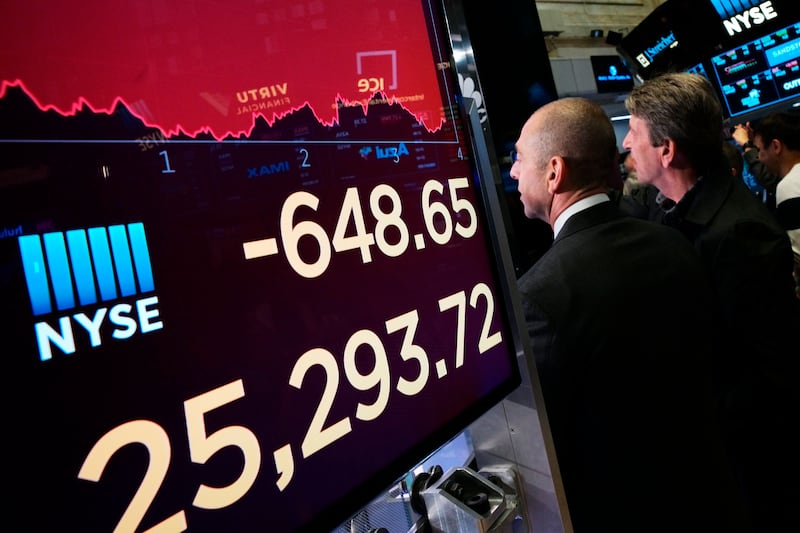 An electronic screen shows the drop in the Dow Industrials, Monday, May 13, 2019, at the New York Stock Exchange. U.S. stocks moved sharply lower Monday on Wall Street and extended the market's slide into a second week as investors seek shelter from an es