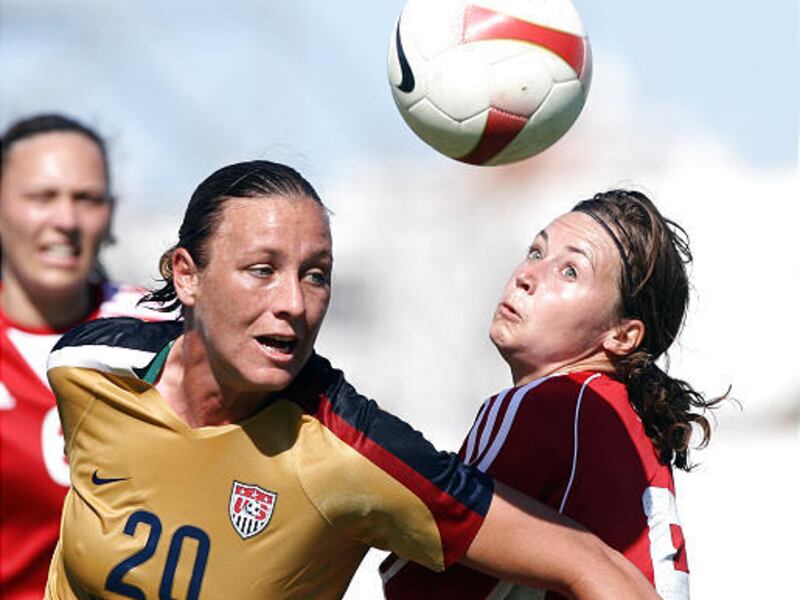Denmark's Bettina Hansen, right, vies with Abby Wambach of the United States during the finals.