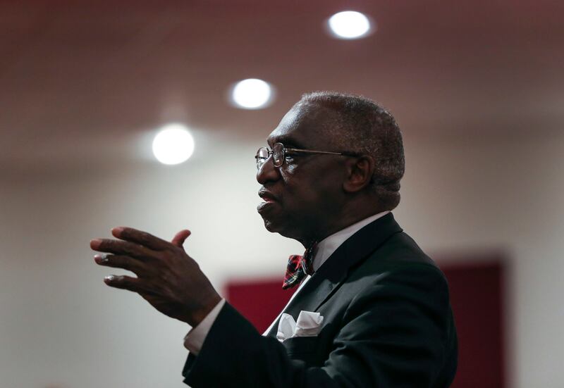 The Rev. France Davis speaks to people, on the Interfaith Bus Tour, in the sanctuary at Calvary Baptist Church in Salt Lake City on Tuesday, Feb. 19, 2019. As part of Interfaith Month, people are able to take a bus to various churches in the valley. The t