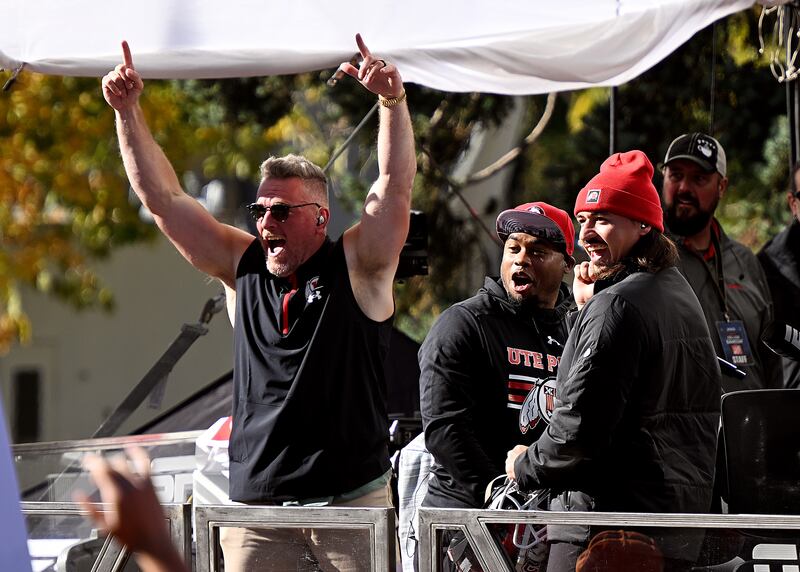 Pat McAfee Steve Smith Sr. and Cam Rising look out at the crowd during the “Pat McAfee Show”