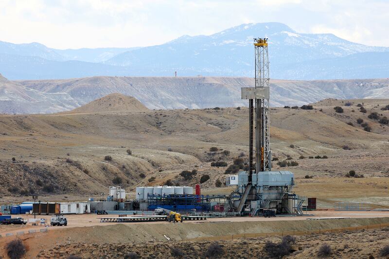 An oil rig drills a well near Roosevelt on Sunday, March 13, 2022.