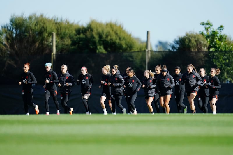 United States players jog across the field during a FIFA Women’s World Cup team practice at Bay City Park in Auckland.