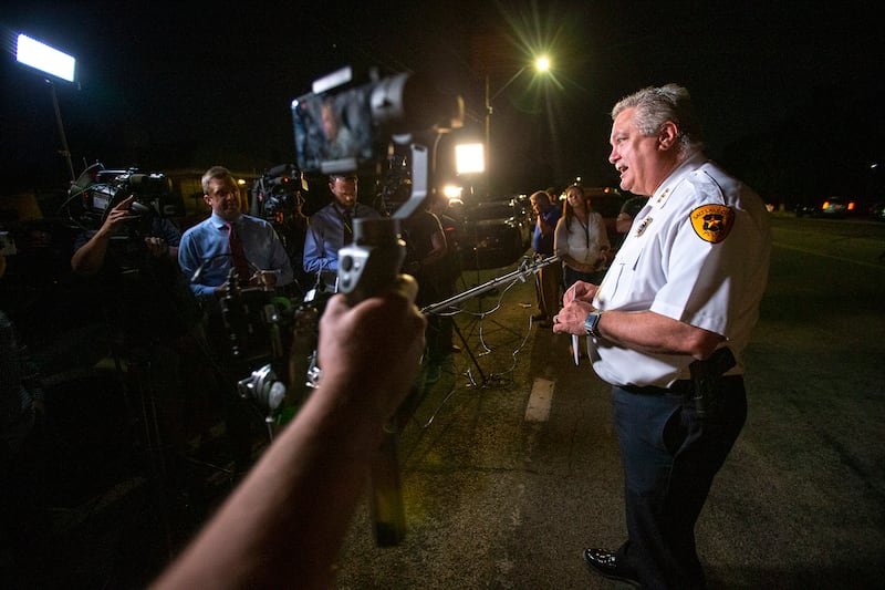 Salt Lake Assistant Police Chief Tim Doubt briefs the media as investigators serve a search warrant at a home at 547 N. 1000 West in Salt Lake City in connection to the disappearance of University of Utah student Mackenzie Lueck on Wednesday, June 26, 201