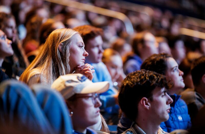 BYU students listen to President Shane Reese and Sister Wendy Reese at the first devotional of the winter semester at the Marriott Center in Provo, Utah, on Jan. 14, 2025.
