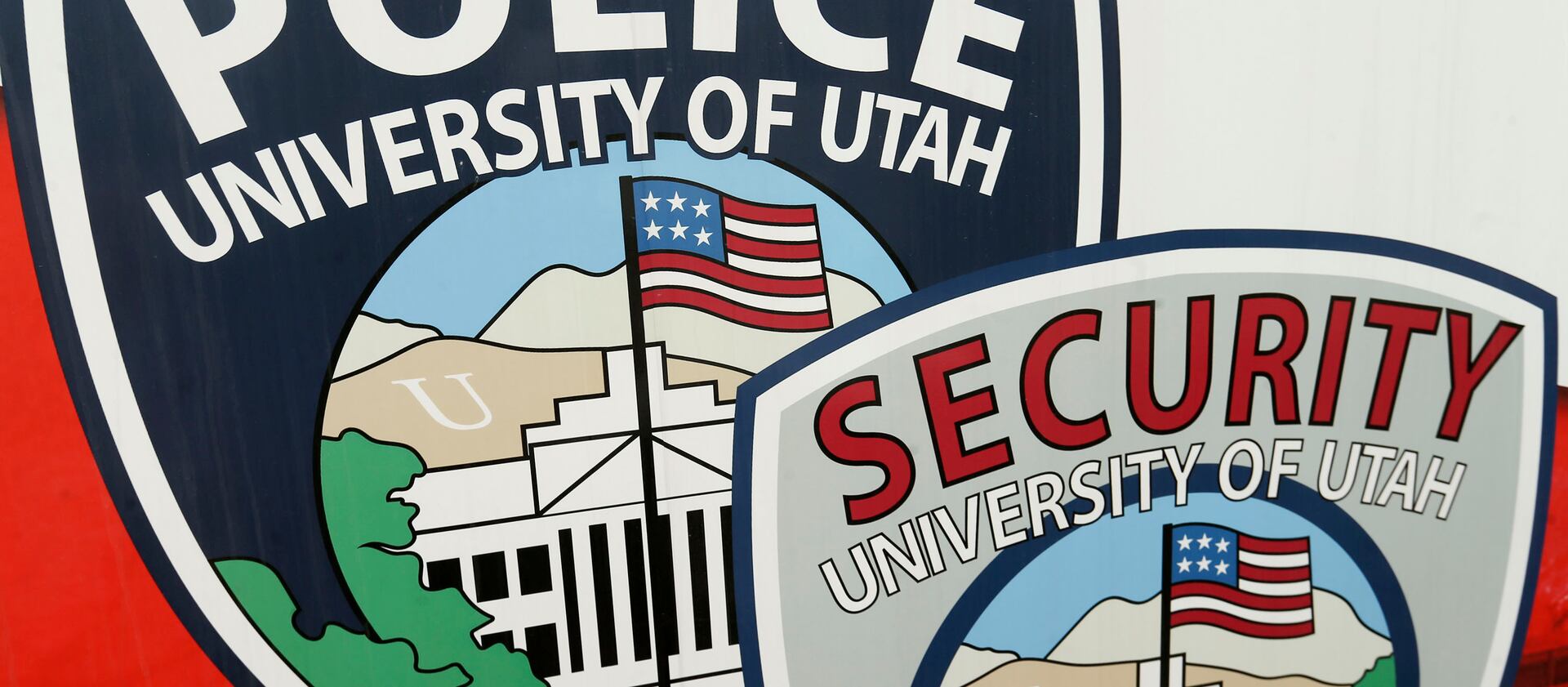 Police and security services emblems are pictured at the University of Utah in Salt Lake City on Friday, April 16, 2021.