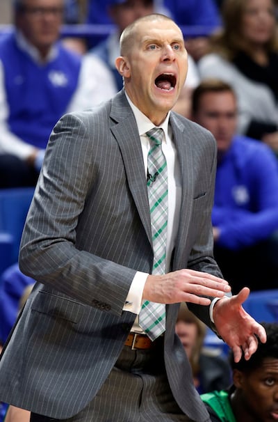 Utah Valley head coach Mark Pope directs his team during the first half of an NCAA college basketball game against Kentucky, Friday, Nov. 10, 2017, in Lexington, Ky.