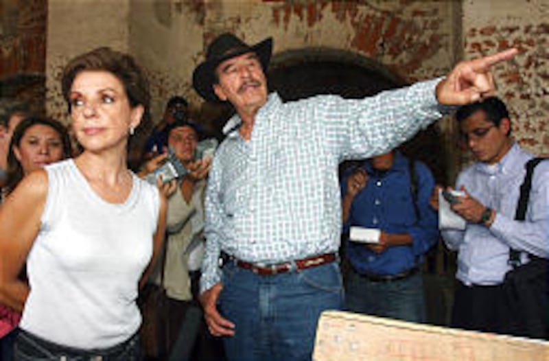 Ex-Mexican president Vicente Fox and his wife, Martha Sahagun, attend meeting with foreign journalists.