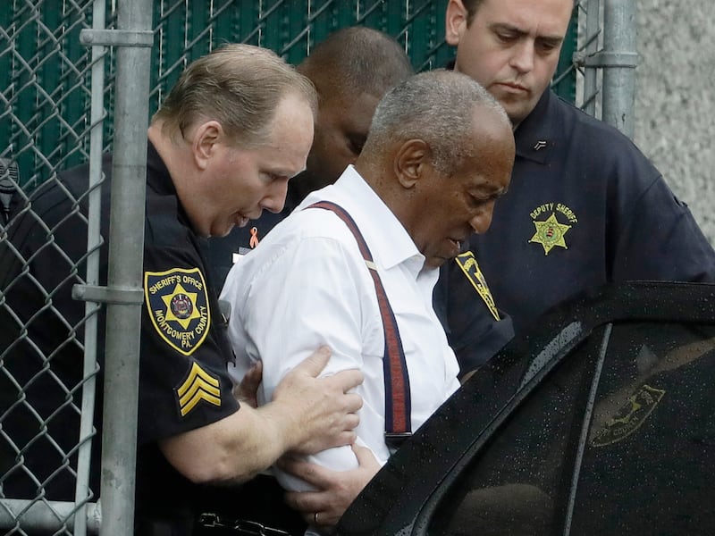 Bill Cosby departs in handcuffs at the Montgomery County Courthouse in Norristown Pennsylvania.